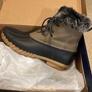 New in box Izod fur storm boots. Color is Taupe and Black